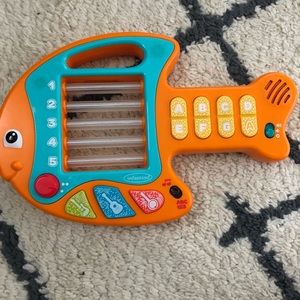 Lights up and plays music